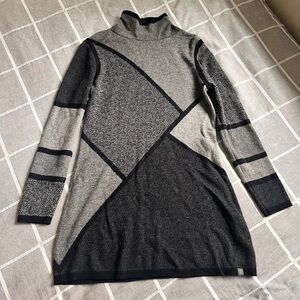 Wool Title Nine ladies dress in large. Has a zip pocket. Gently used.